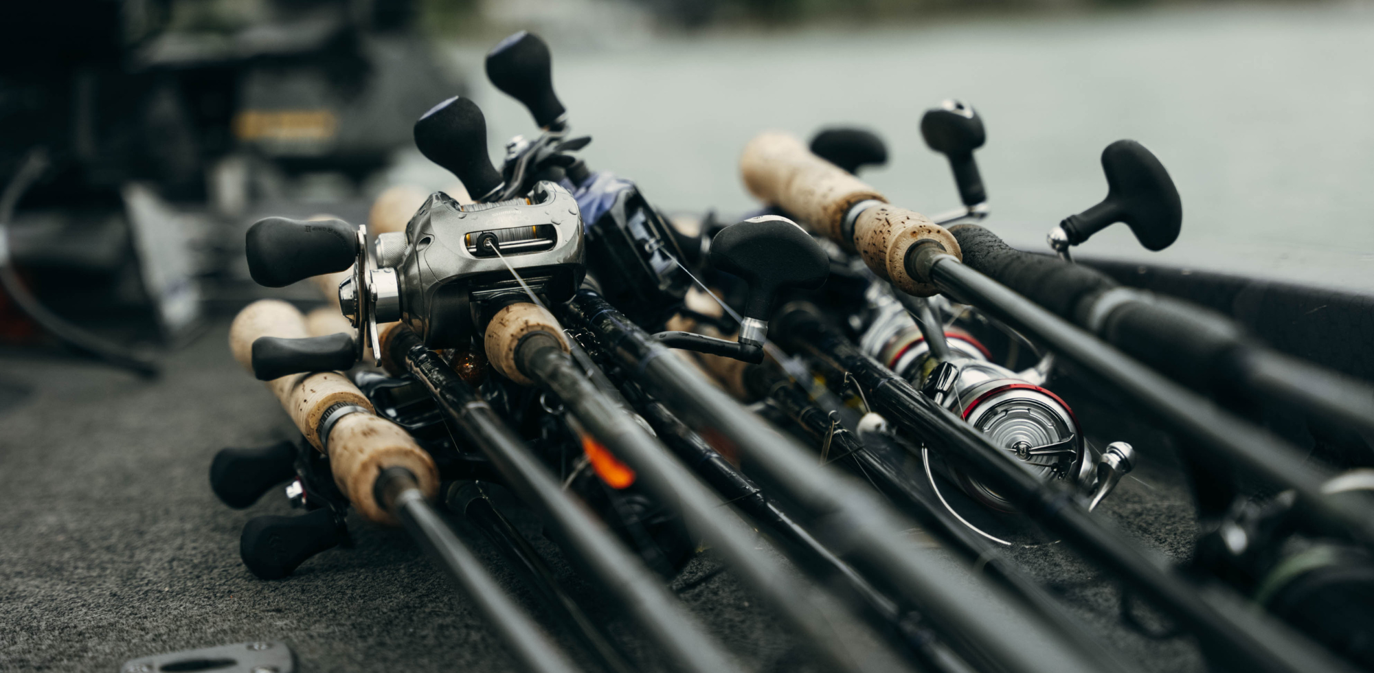 a lot of thorne bros custom rods stacked on boat deck