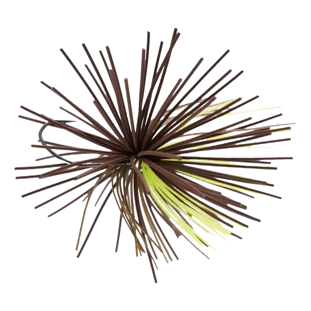 Close-up of a Missile Baits Dice Jig fishing lure featuring brown and yellow flexible rubber skirt strands designed for fishing tackle use.