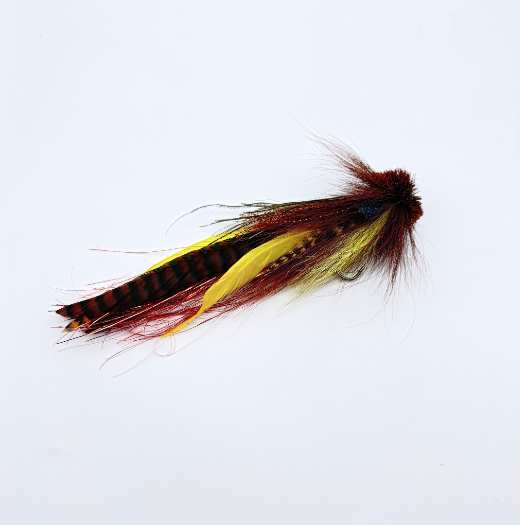 Single Buford Urban Fly Co. fishing lure featuring layered feathers in yellow, brown, and red tones designed for fly fishing and fishing tackle enthusiasts.
