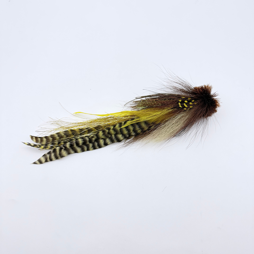 Single Buford Urban Fly Co. fishing lure featuring brown, yellow, and black feathers with detailed patterning designed for fly fishing and fishing tackle use.