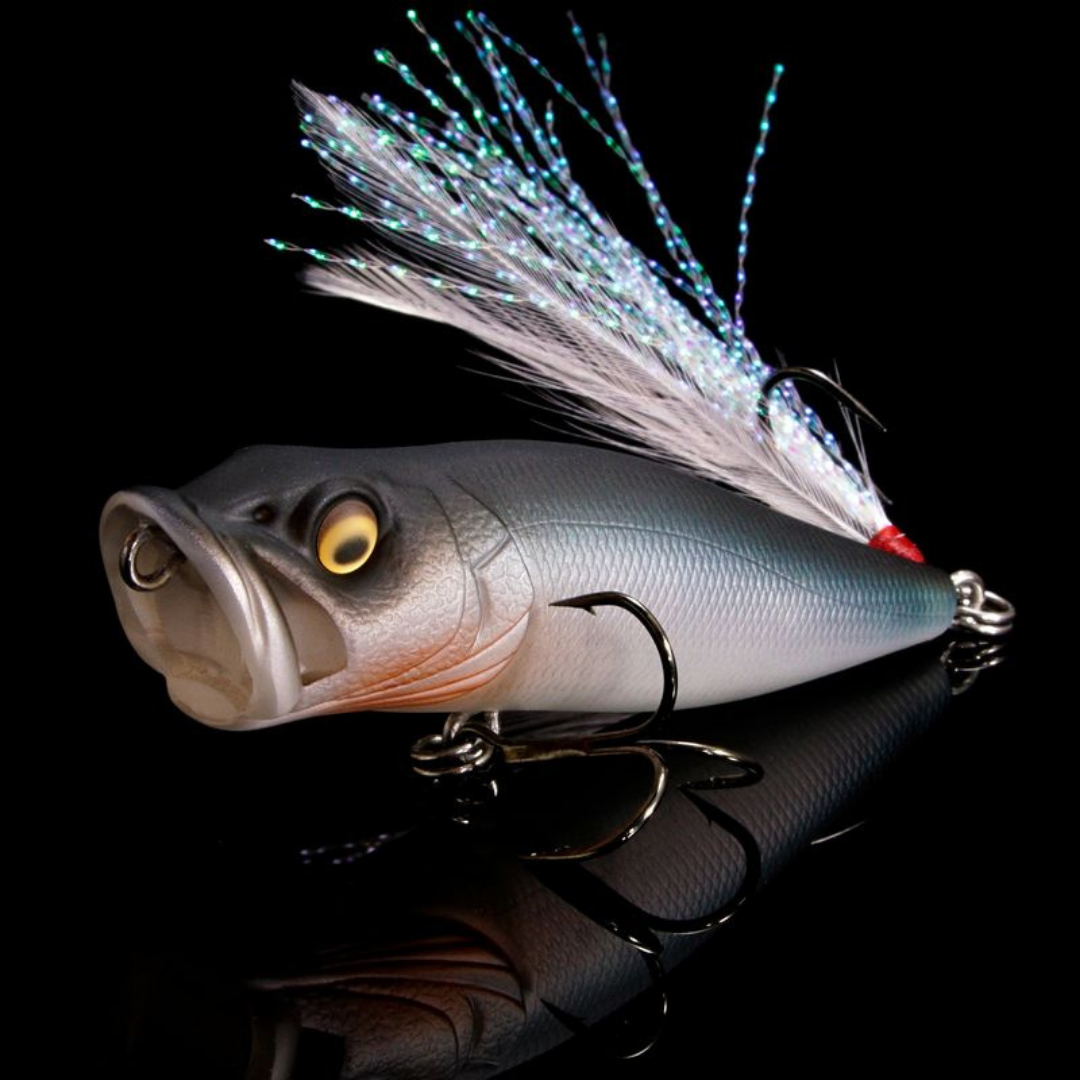 Megabass Pop-X topwater fishing lure with a realistic fish profile silver finish feathered tail and treble hooks for freshwater fishing tackle