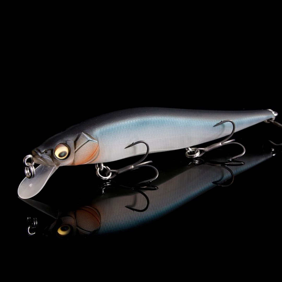 Megabass Vision 110 Jr. silver blue minnow fishing lure with treble hooks and diving bill displayed as detailed fishing tackle for anglers