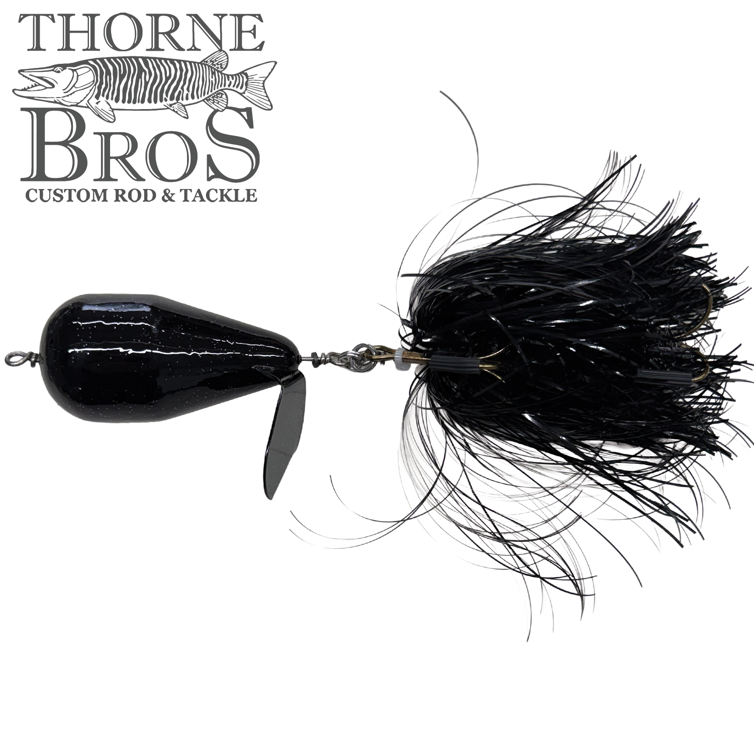 Spanky Baits Violence black fishing lure featuring a streamlined body with a propeller blade and feathered skirt designed for musky fishing.