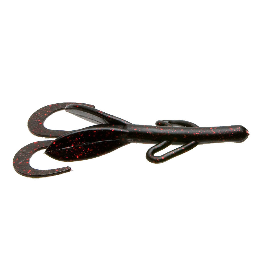 Zoom Baby Brush Hog fishing lure in black with red flakes, featuring twin curled tails and segmented body for lifelike movement in water.