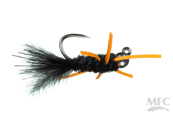 Close-up of a black and orange T.J. Hooker fishing lure with a sharp hook and feathered tail, designed for effective freshwater fishing tackle use.