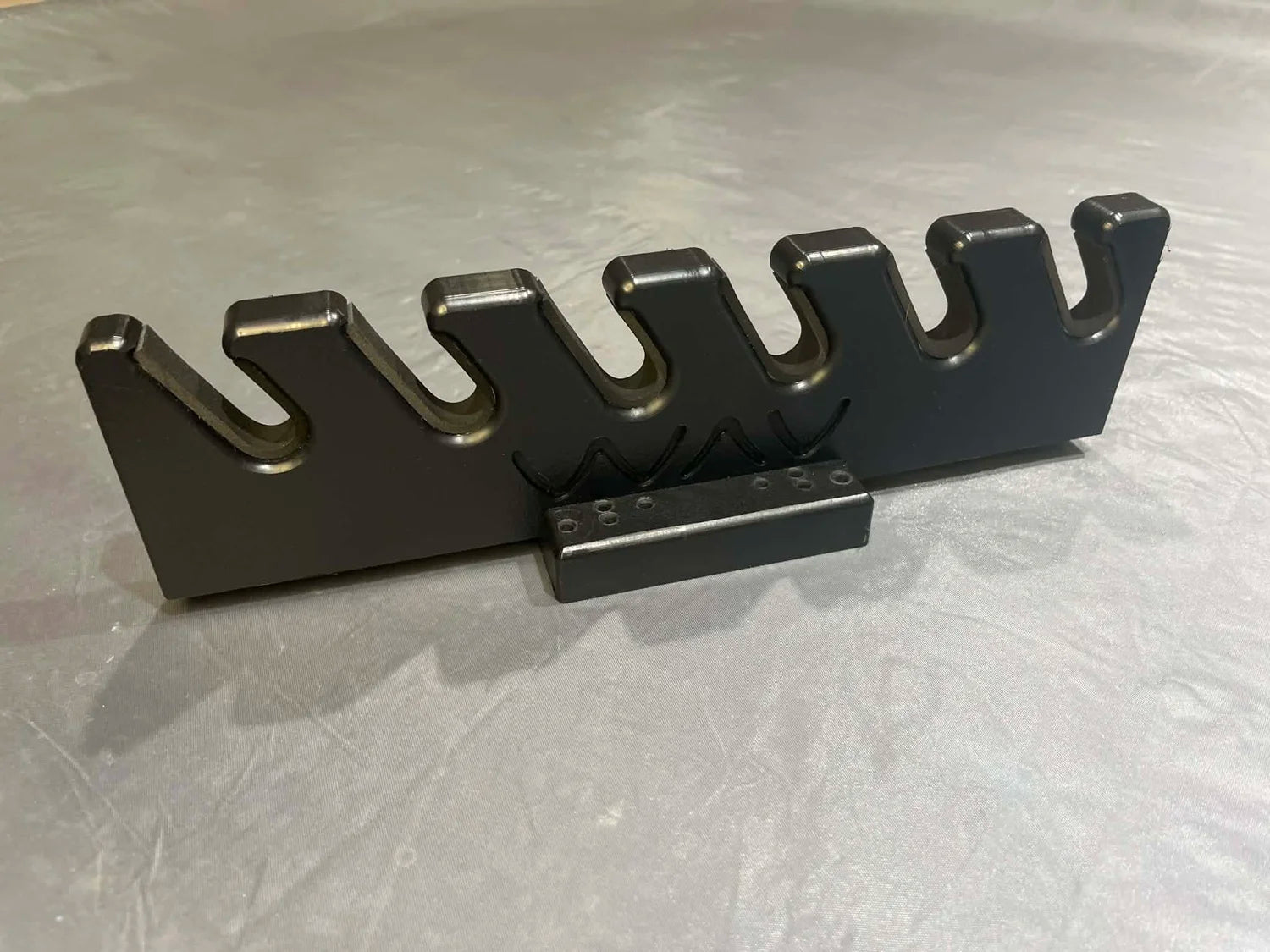 Simulated alt text for Wav Products Rod Holder / Rod Organizer   SKU: WAV6 for thorne-bros-custom-rod-tackle.myshopify.com. You are an expert SEO agent. You will generate an ALT text for this image. <Store_Context> Business Details: - Premier Midwest shop specializing in musky tackle...