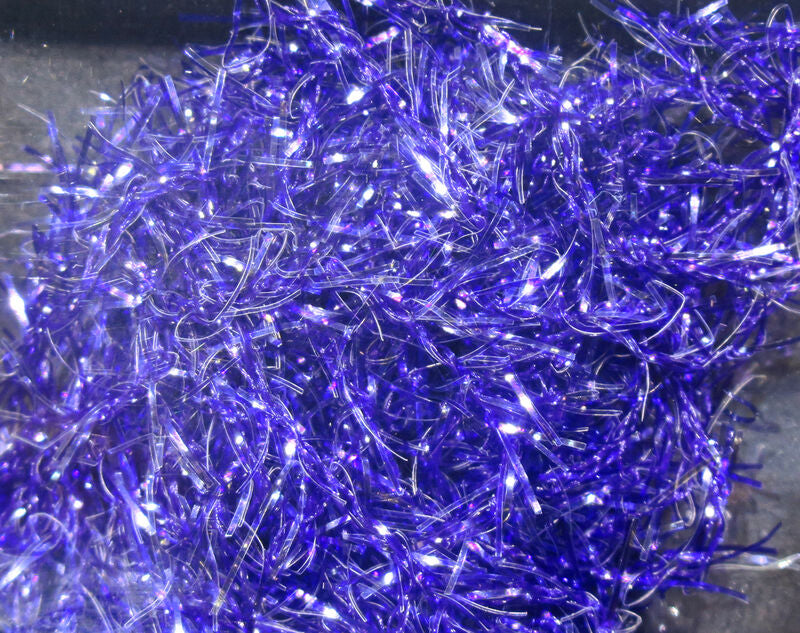 Close-up of shimmering blue synthetic fibers with fine, iridescent strands, used for fly tying in fishing, identified as Hareline Polar Chenille - Micro.