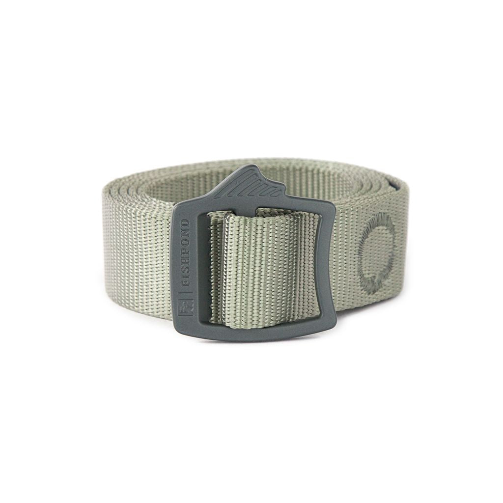 Fishpond Webbing Belt made of durable, sturdy nylon webbing with a matte black buckle, designed for comfort and strength during fishing activities.