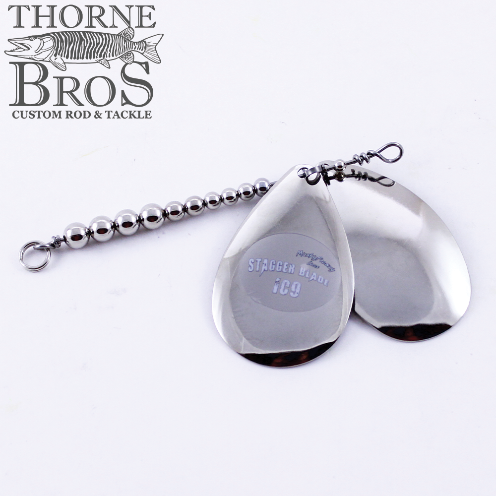Musky Frenzy Blade Attachments featuring two polished nickel-colored fishing blades connected by a beaded chain, designed for enhancing musky fishing lures.
