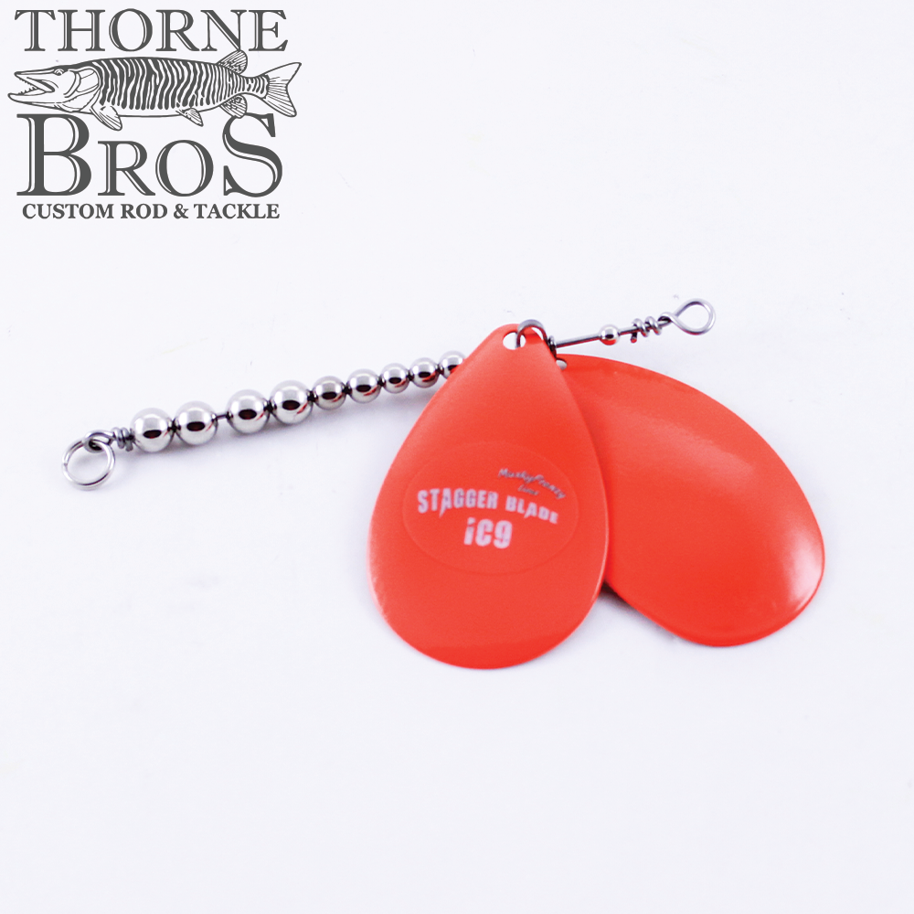 Musky Frenzy Blade Attachments featuring two bright orange metal blades connected to a silver beaded swivel wire, designed for fishing tackle to attract musky fish.